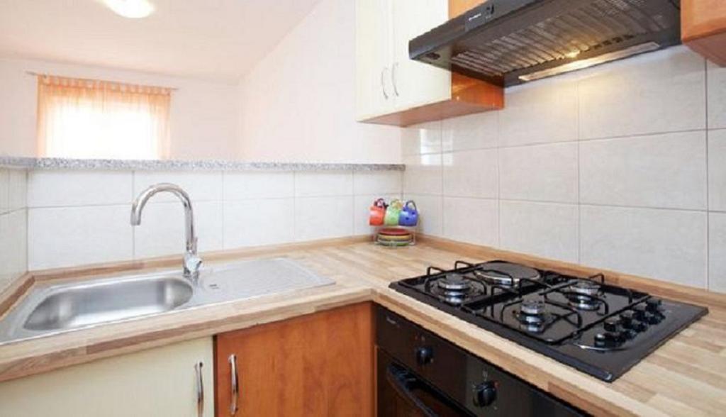 Apartments And Rooms Misic Trogir Bagian luar foto